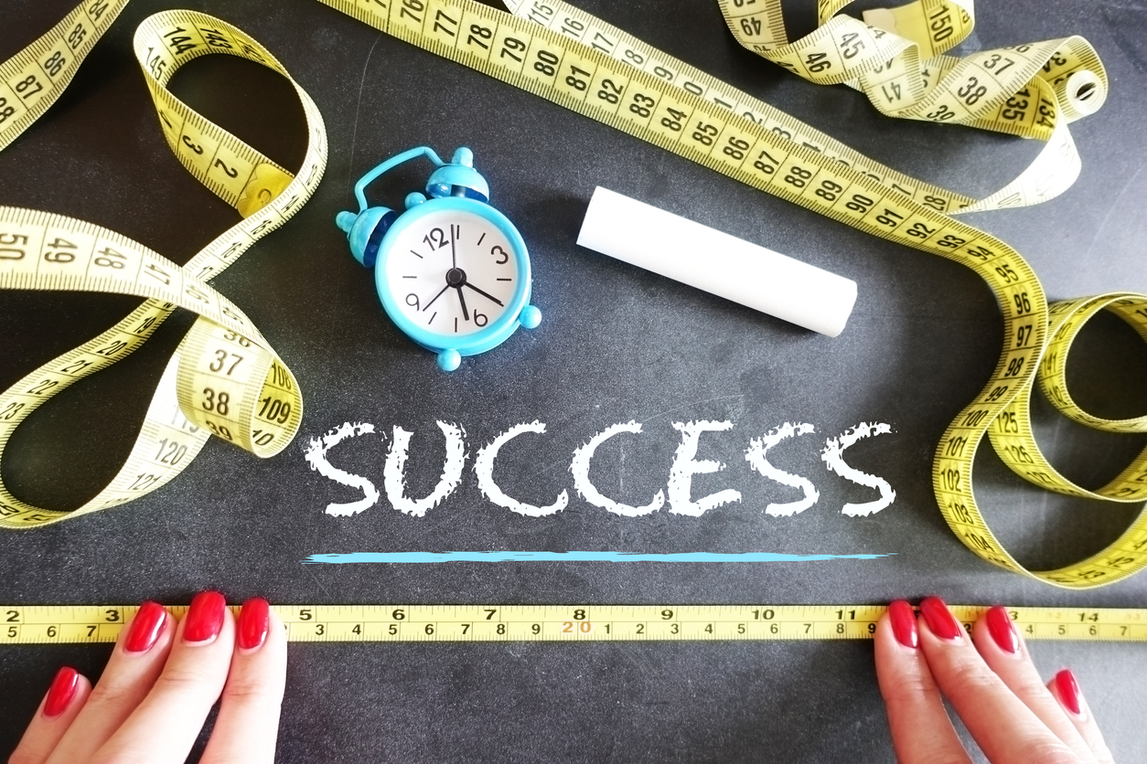 Woman-Measuring-Email-Marketing-Success